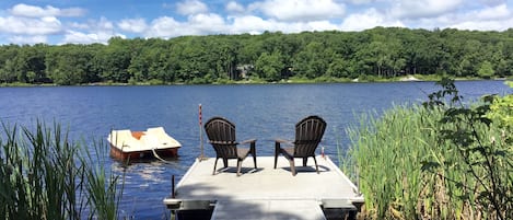 View of lake from private dock. Rental includes pedal boat, canoe, kayaks.