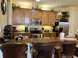 Breakfast bar with chairs 