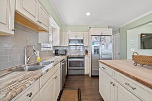 A completely upgraded, top of the line kitchen awaits you.