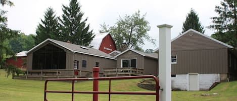 FARM HOUSE: view from the rear - entertainment area to left, hot tub in center