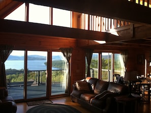 Sunlight streams in from front of house facing Newfound Lake