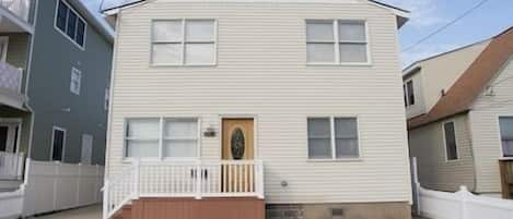 This is a Beach Block, Second Floor Condo that includes two off street parking spaces, six Beach Tags and is steps to the Guarded Pristine Brigantine Island Beach.