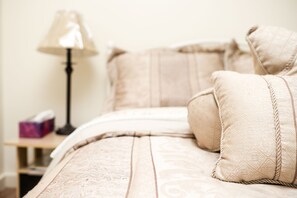 Layers of sheets and comforters for your warmth. With extra pillows.