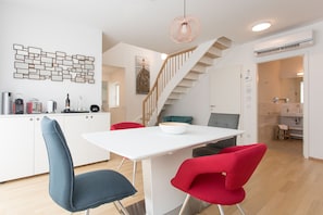 Dining Area and the view of stairs to upper floor