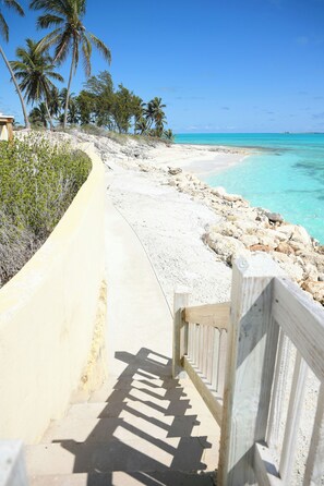 The walkway with the beach in the background