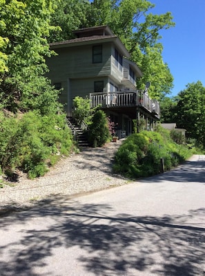 view of the house from the end of the driveway facing north