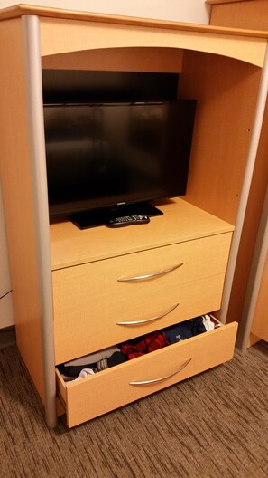 TV and dresser in master bedroom