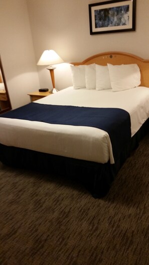 Room has 2 nightstands and closet