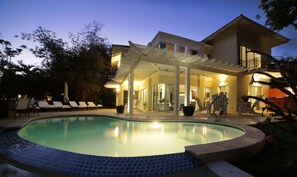 Villa and pool at sunset