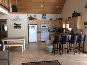 kitchen area, seats 8 adults comfortably.