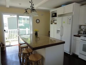 Kitchen looking out to side porch