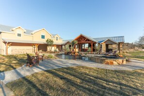 View from Main house to Pool house and Outdoor Kitchen.