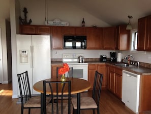 Kitchen area is clean and up-to-date