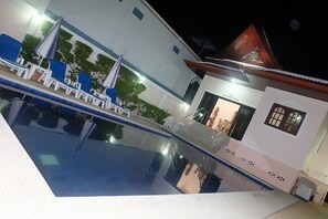 Majestic Villas 1, 2 bedroom. Pool area at night time.