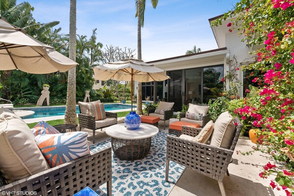 Outdoor pool lounging and pool oasis