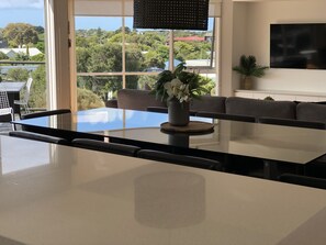 Entertaining living area over looking the bay and house tops
