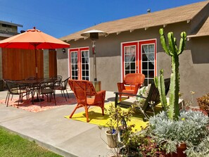 Your private enclosed patio with eating area, lounge area, grill, patio heater.