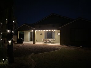 View at night with outdoor lights on