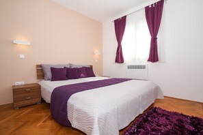 The first bedroom is situated on the ground floor and it is suitable for two persons.