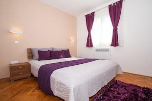 The first bedroom is situated on the ground floor and it is suitable for two persons.
