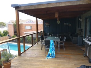 Huge entertainment deck overlooking pool and lake