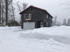 Front side of our home in the snowy winter! You also have access to the garage.