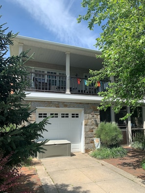 From curbside. Driveway is for guests’ use.
