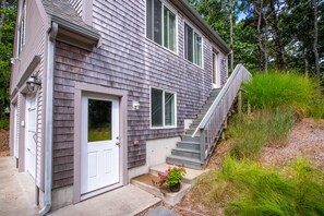 Front stairs to the apartment.  Ground level door leads to garage/game room