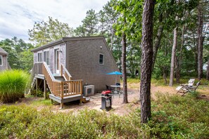 Back stairs from apartment to private patio and grilling area