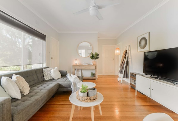 Lounge area with smart TV, air conditioning and heating