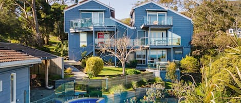 Rear view of property with Pool and Spa