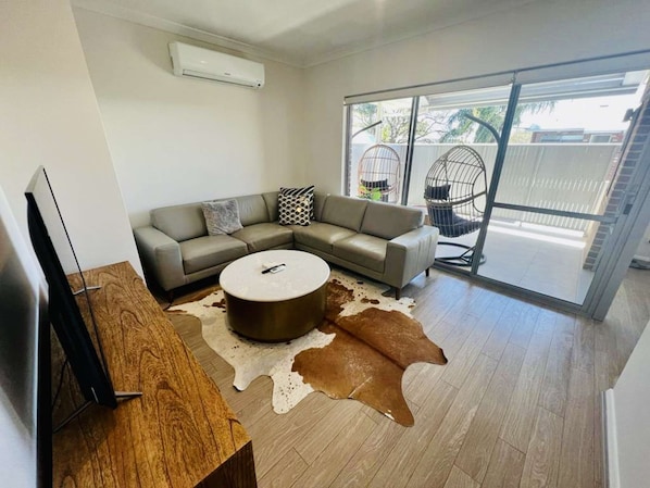 Living area with balcony view