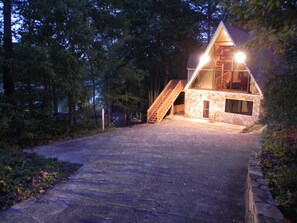 View in the evening, path to dock is lit by led lights.