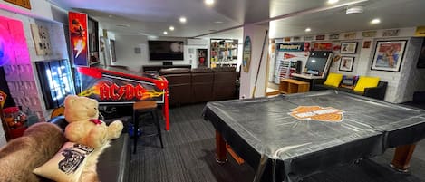 The Ultimate Man Cave, with ACDC Pinball, pool table and surround sound TV