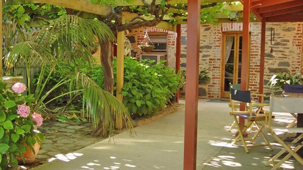 our beautiful courtyard with 100 year old vines