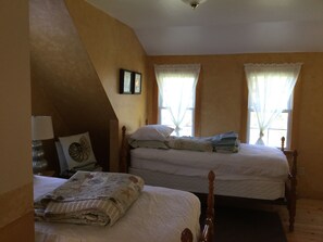 Upstairs bedroom with twin beds