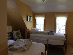 Upstairs bedroom with twin beds