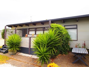 Front of the cottage looking to BBQ area.