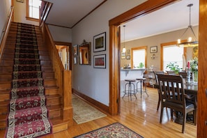 Welcoming foyer - dining & kitchen to right, living to left, bedrooms upstairs.
