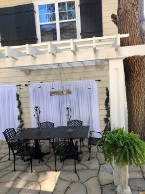 Relax beneath the pergola