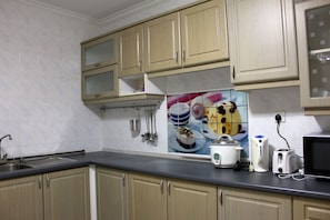 Dry kitchen with cooking appliances