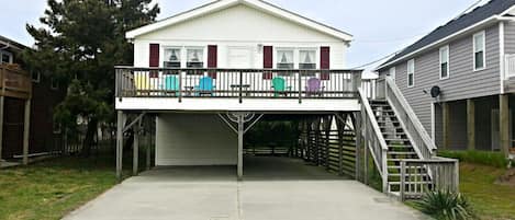 Front of house with large sun deck. Great place to relax after the beach.