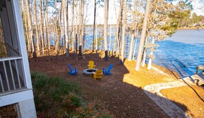 Firepit in the back yard with seasoned hard wood included. 