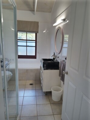 Seperate shower and bath.