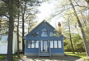 The bay house has a great front porch with plenty of seating (andirondack chairs