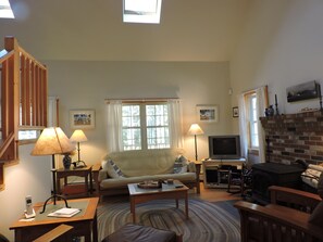 Living room, looking towards the front door