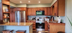 Puamana 14A Open, well equipped kitchen - This is a pleasure to cook in while enjoying family and friends.
