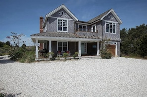 Extensive parking space, and wonderful covered wrap around porch.