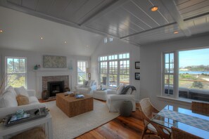 Gas fireplace and modern white decor, make this home very cozy.