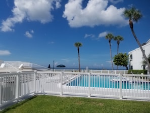 Heated Pool directly on the beach, next to Club House and Deck Area.